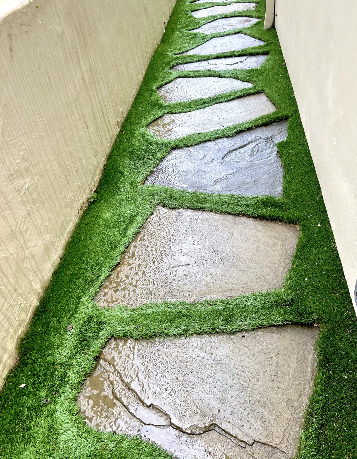 Stepping-stone pavers set in artificial turf