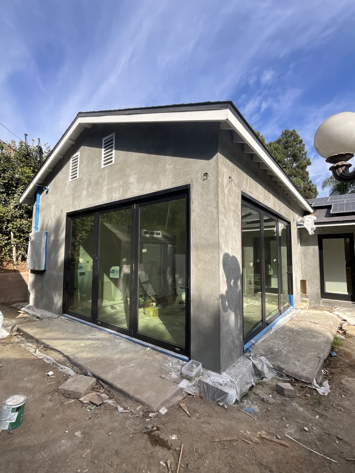 Modern ADU exterior with black-framed windows